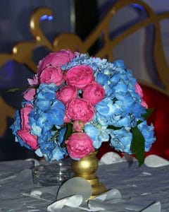 Blue hydrangeas and purples peonies on gold base