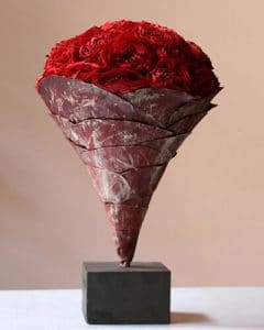 Cone shaped flower bases with roses