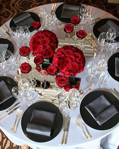 Black-red table decoration in vases