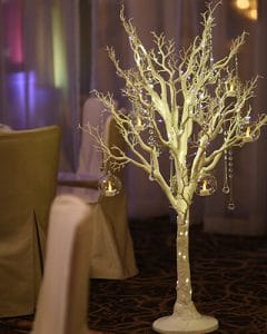 Wedding room decoration with enchanting white décor trees and crystals